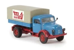 Brekina Automodelle 58047 1955-1968 Steyr 480 Low-Side Delivery Truck, Tarp Cover - Assembled -- A&O (light Blue, Taupe, Red, German Lettering), HO Scale